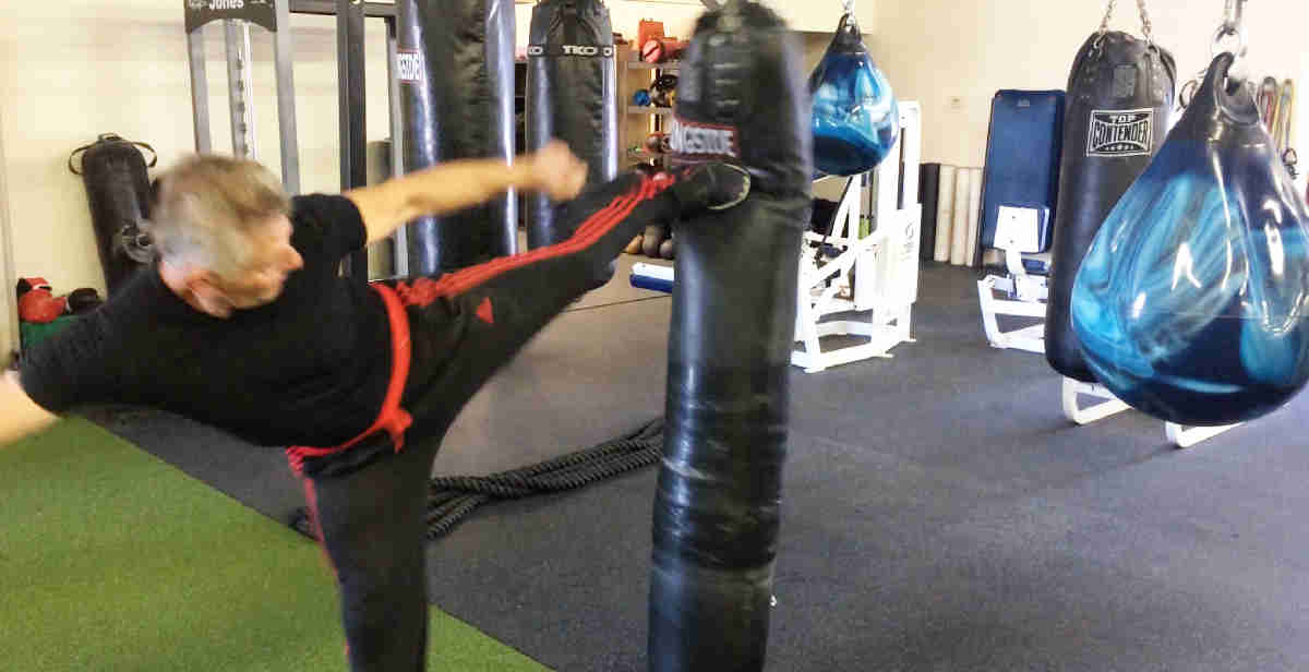 side kick on heavy bag